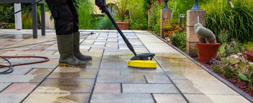 Someone cleaning patio